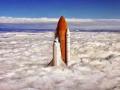 Space-Shuttle-Above-clouds